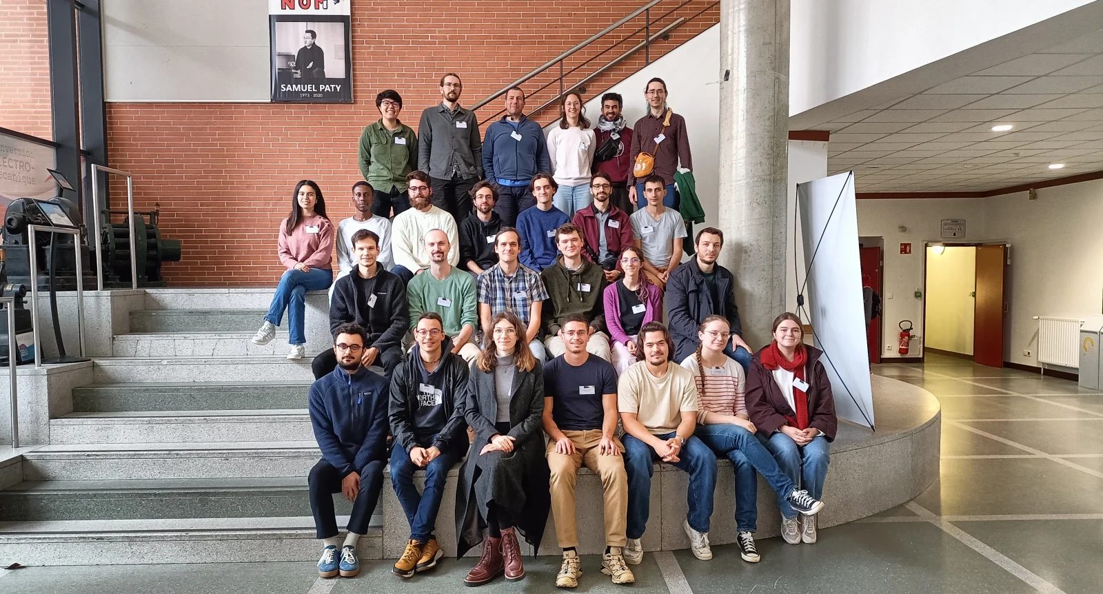 Group photo of YoungPEx participants in the hall of INP-ENSEEIHT, Toulouse.